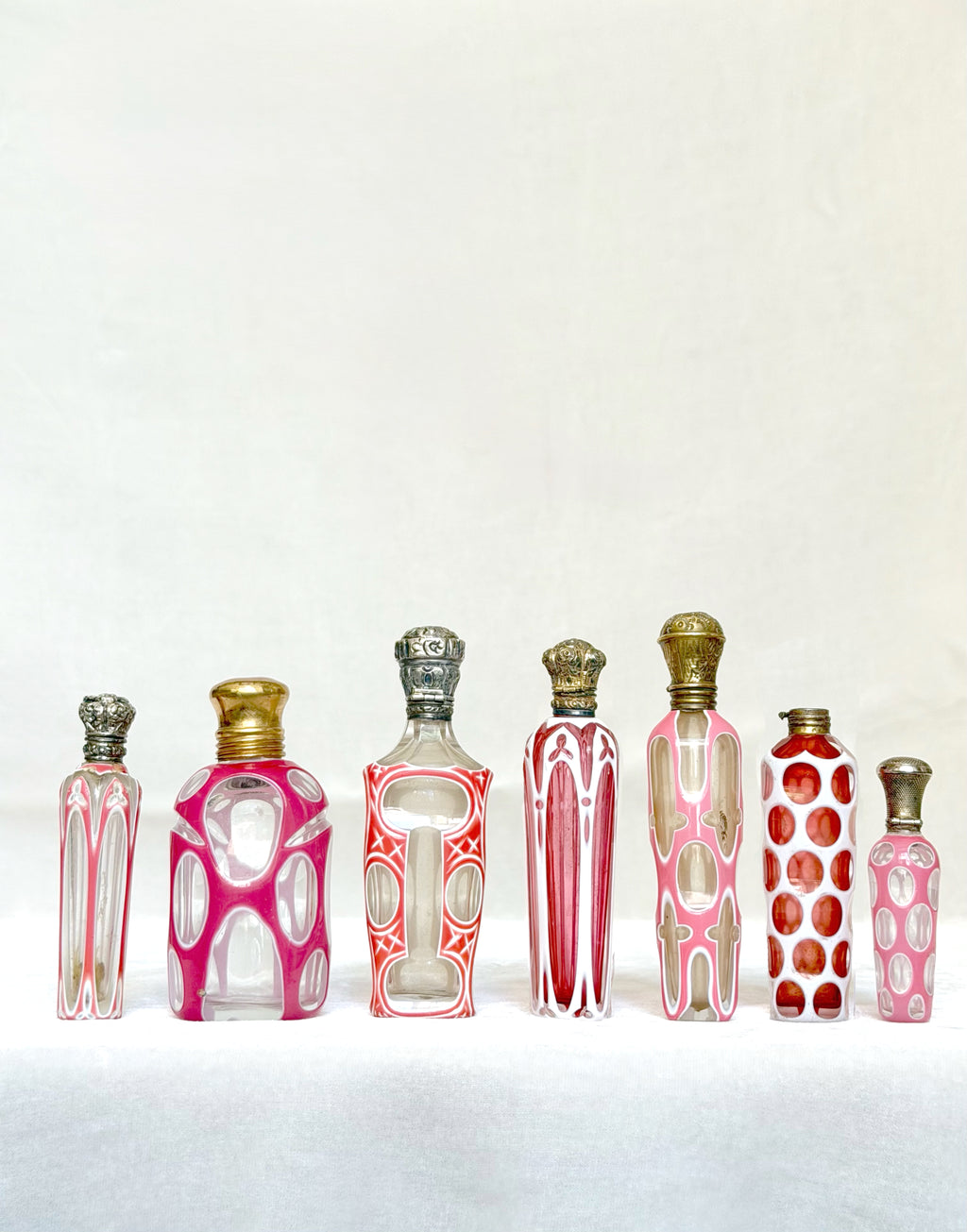 Collection of seven Bohemian perfume bottles