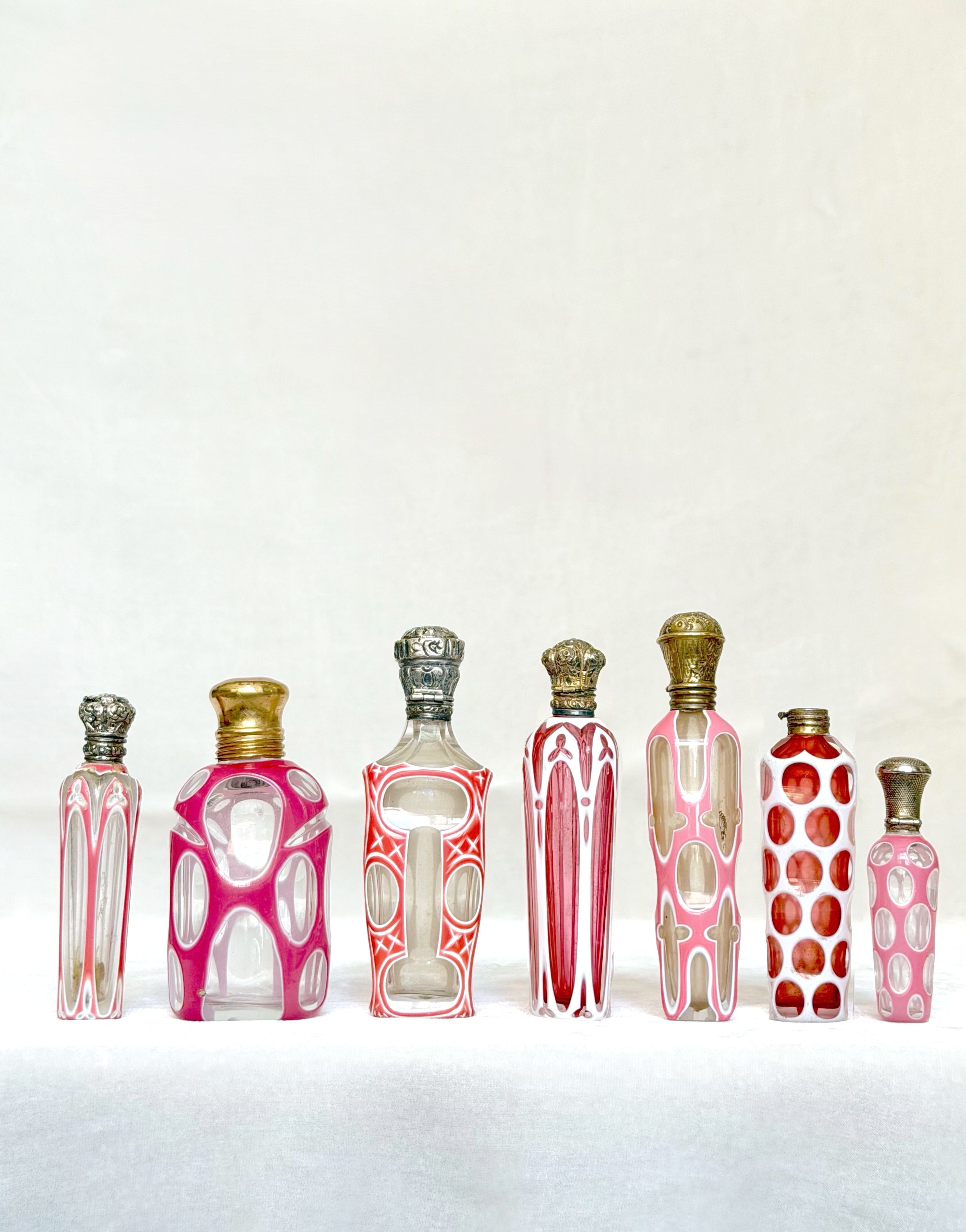Collection of seven Bohemian perfume bottles
