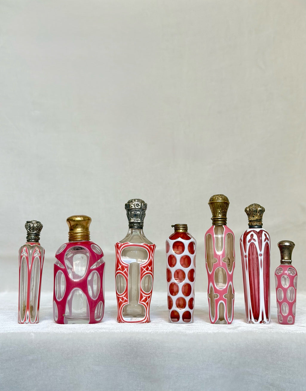 Collection of seven Bohemian perfume bottles