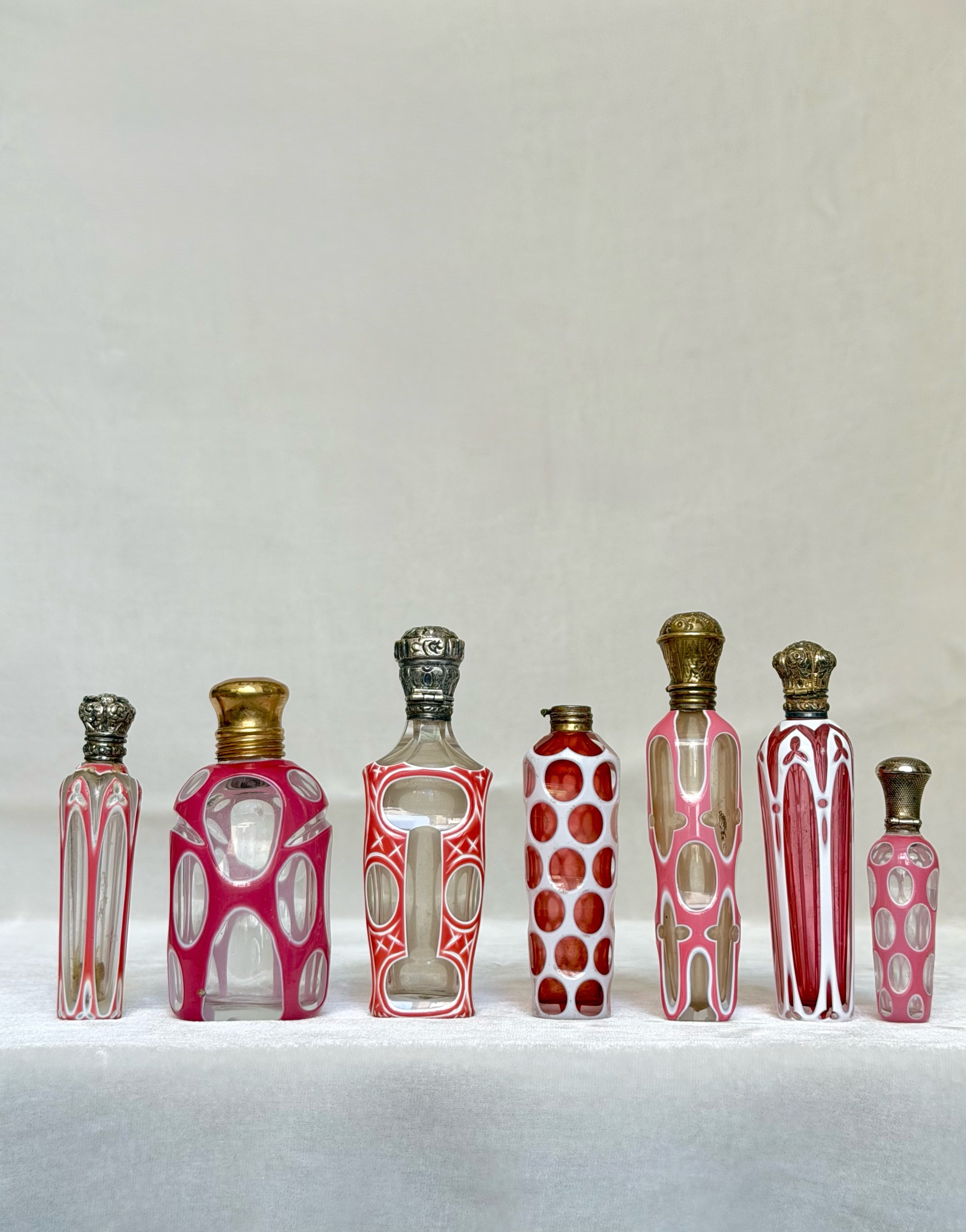 Collection of seven Bohemian perfume bottles